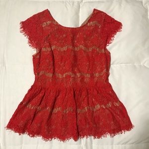 Bright orange lace top